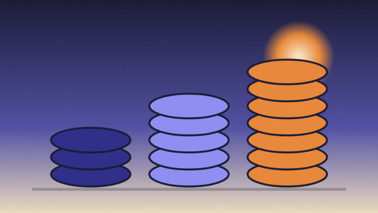 Tres pilas de monedas de altura creciente